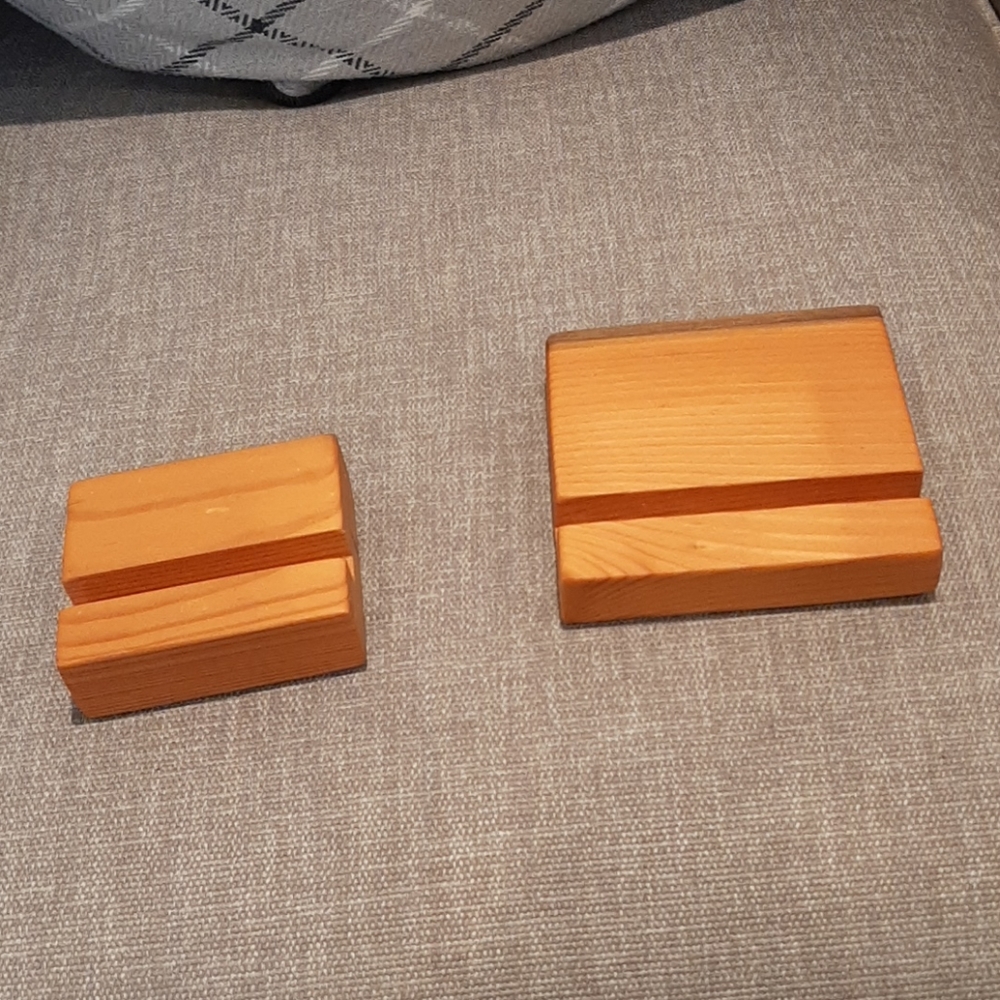 2 handmade wooden phone stands